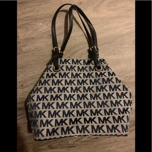 Gently used blue and grey MK shoulder bag